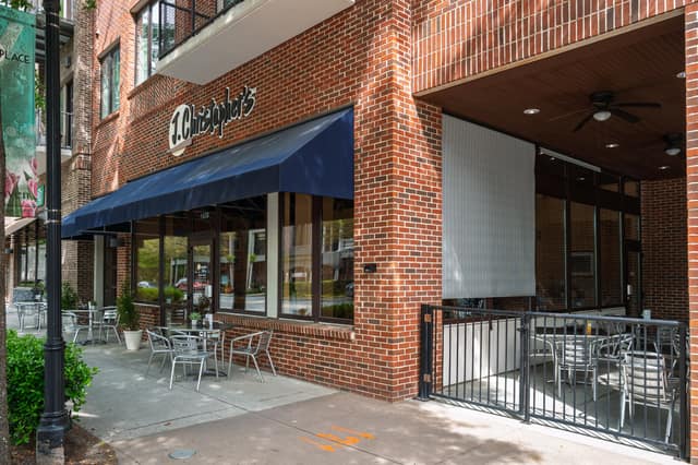 J. Christopher's with sidewalk patio seating at Village Place Brookhaven