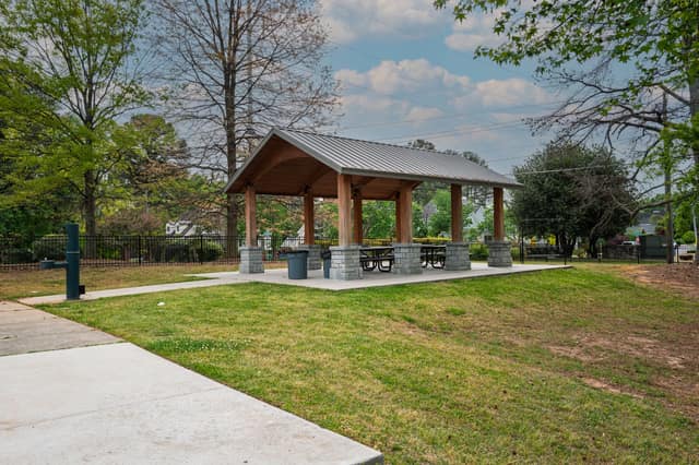 Covered picnic pavilion and green space at Ashford Park in Brookhaven